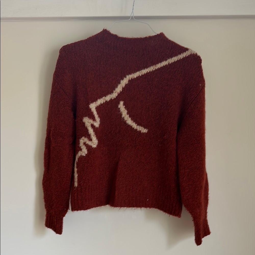 Paloma Wool Rust colored face sweater